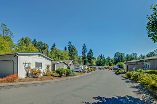 A row of mobile homes in a residential neighborhood.